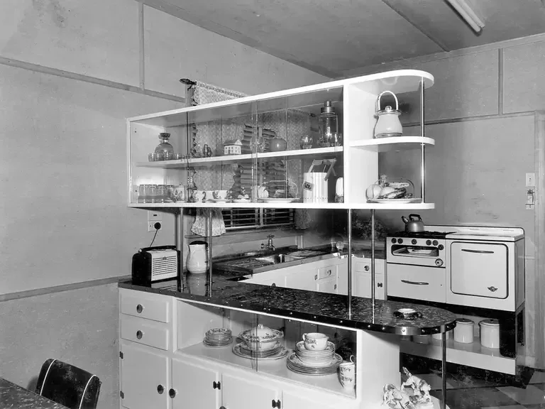 A clean kitchen and dining area